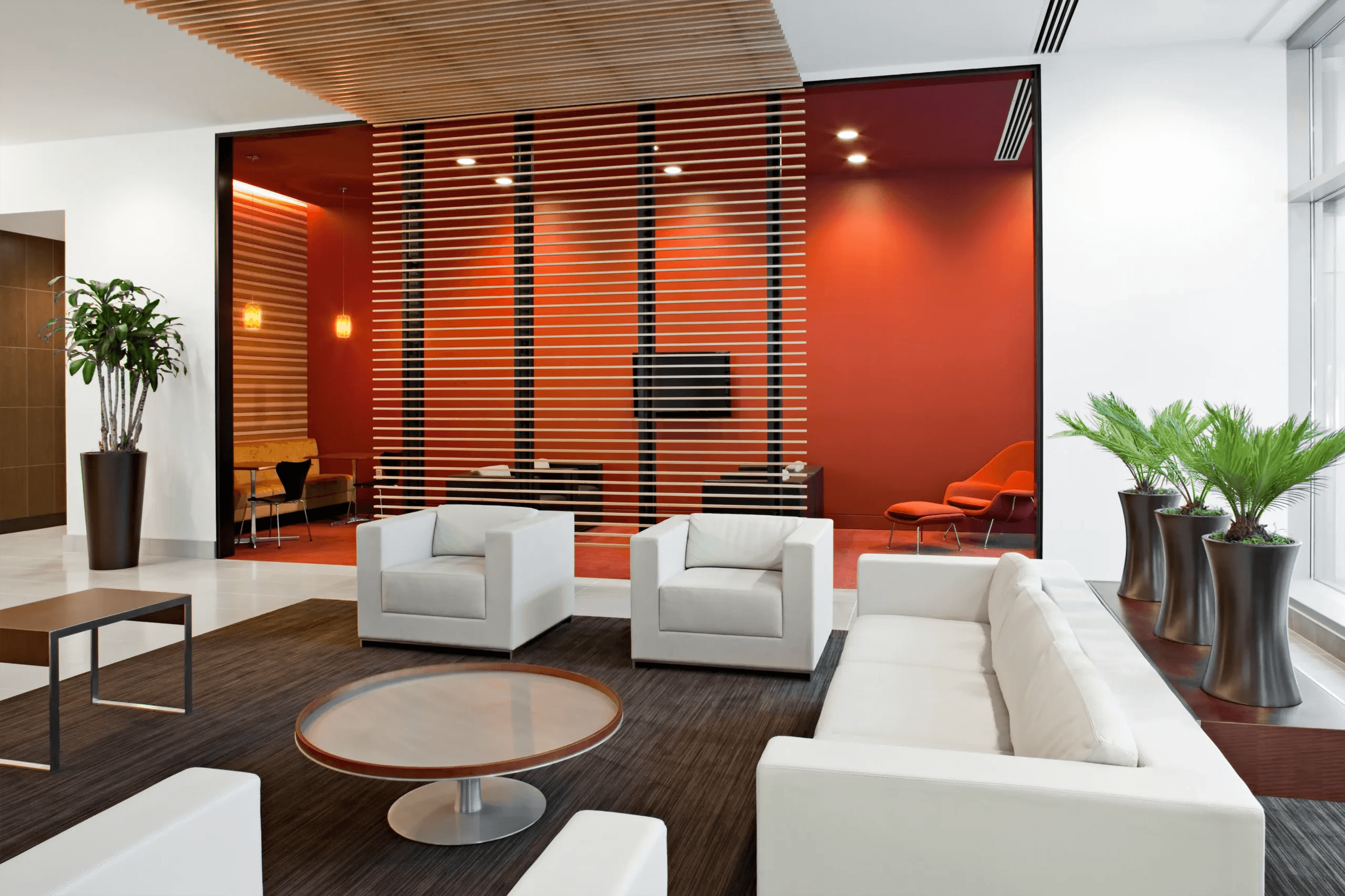 Executive commercial office lounge with custom architectural lighting