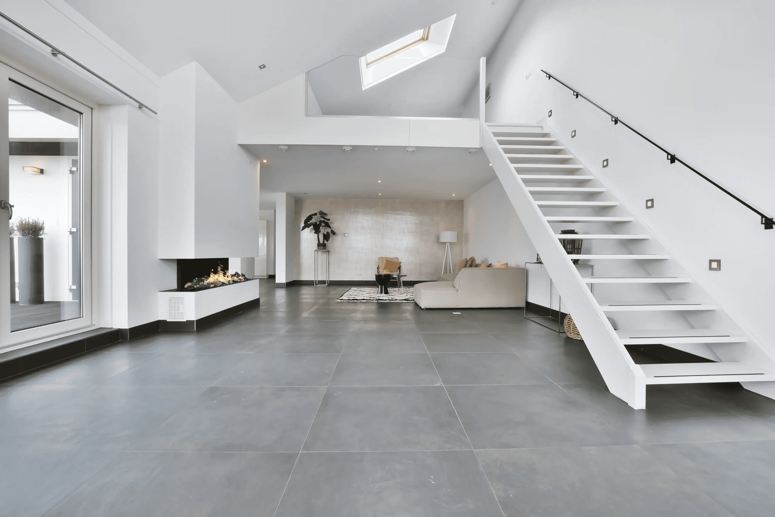 Finished luxury hardwood and designer stone flooring installation