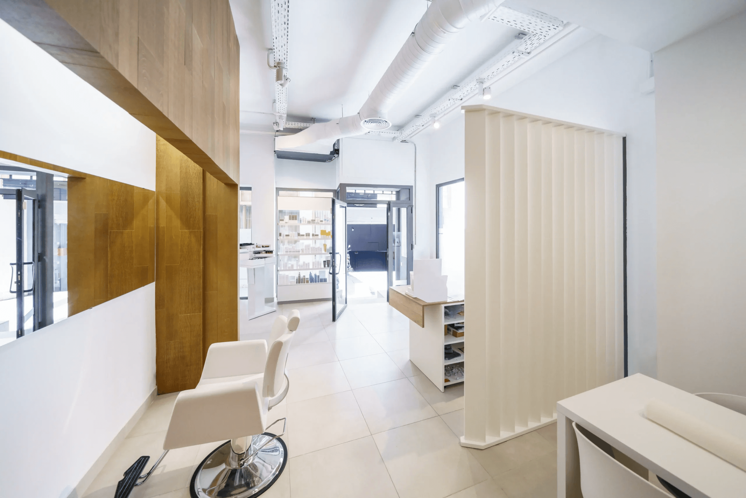 Modern medical clinic reception with clean contemporary lines and glass entry
