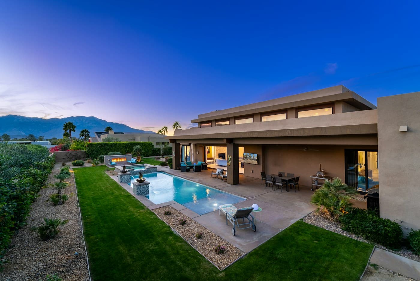 Contemporary desert home and pool under a clear sky